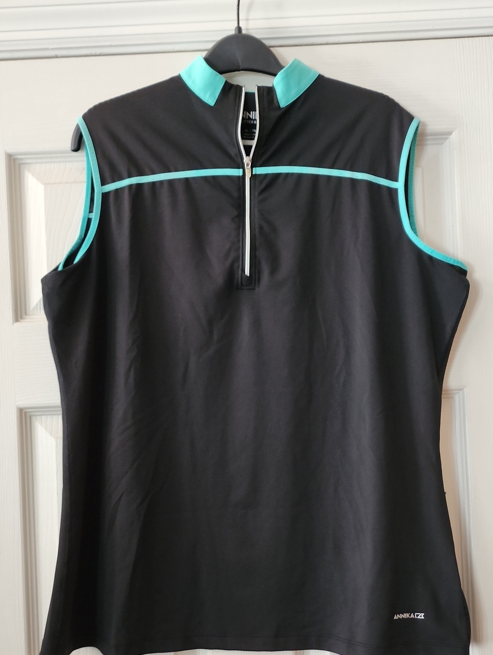 Annika Sleeveless Zip Polo
